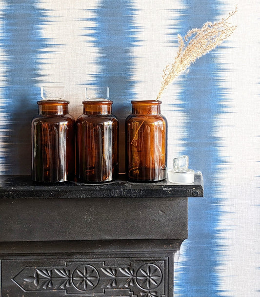 Set of three small brown vintage chemist apothecary bottles with glass stopper